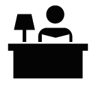 Vector icon of man sitting at table with opened book and lamp